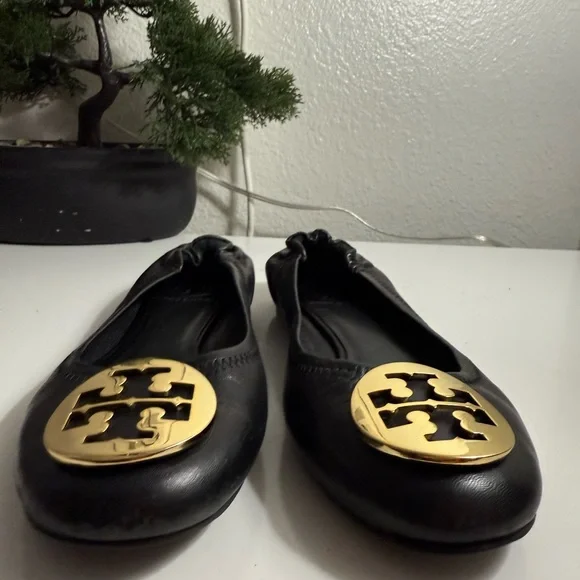 Tory Burch Black Flats with Gold Emblem - Picture 2 of 4